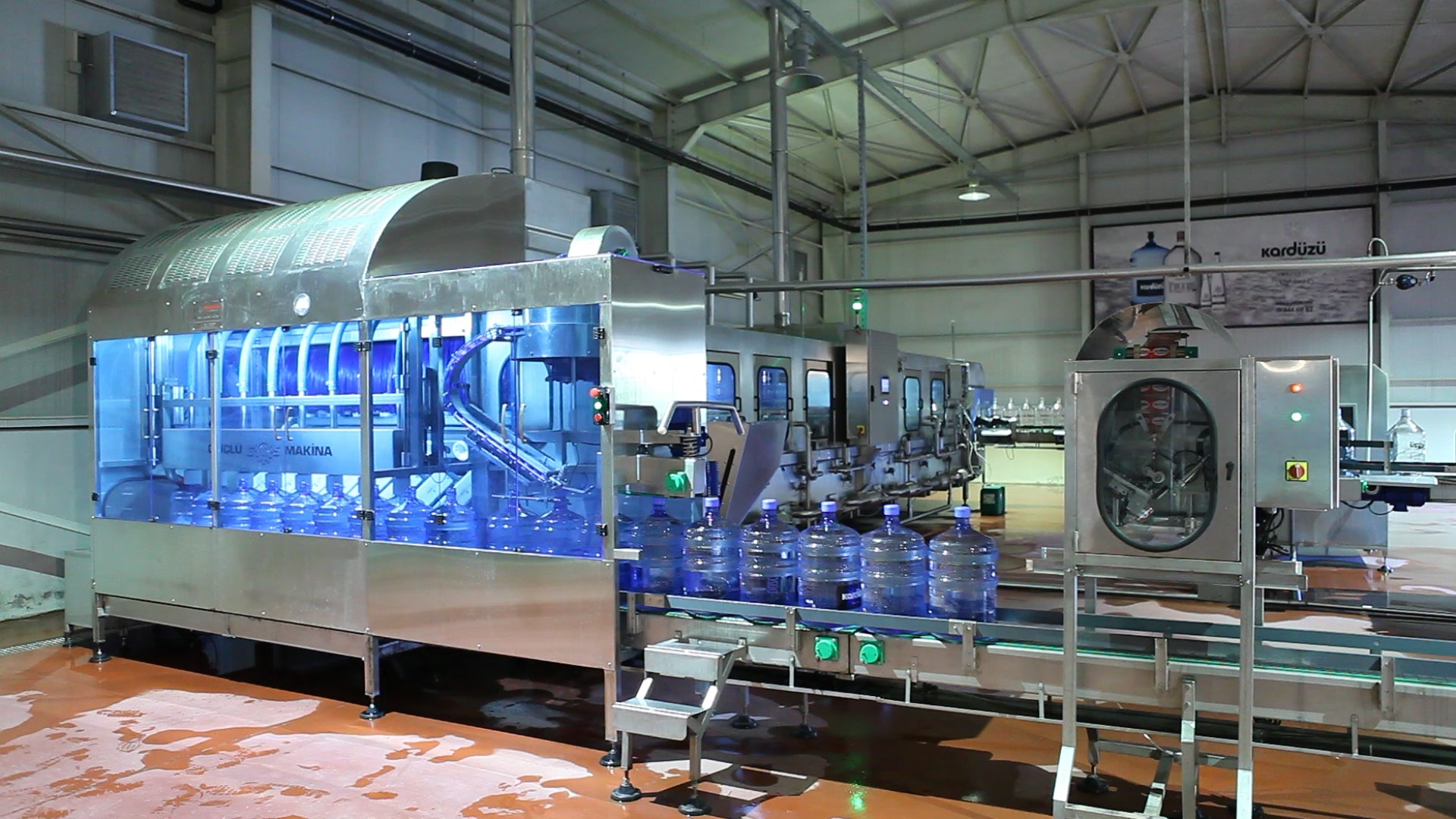 HY-1200 | 1200 bph Polycarbonate & Glass Hybrid Gallon Filling Line (19L / 15L)